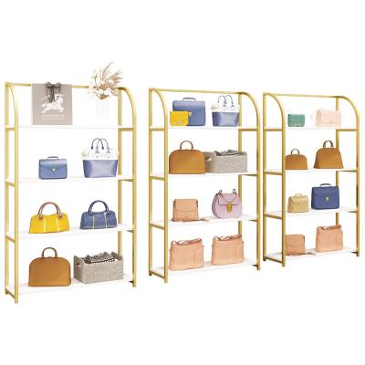 China Shops Luxury Shiny Gold Display Stand Rack Metal Shelf For Retail Store Clothing Garment Shoe Bag Merchandise Display for sale