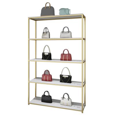 China Modern Shops Metal Shoe Racks For Boutique , Luxury Gold Shoe Rack Display Stand For Store for sale