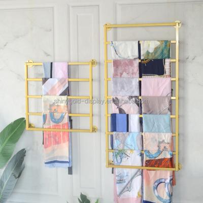 China Shops Retail Store Commercial Gold Stainless Steel Metal Cloth Shiny Scarf Towel Display Wall Mounted Rack for sale