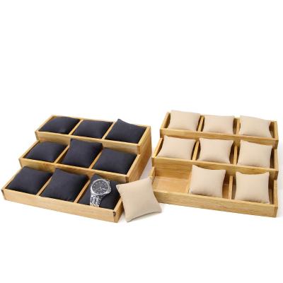 China Watch Shop Wholesale Customized Watch Tray Display Box Wooden Watch Rack Fabric Pillow Watch Stand for sale