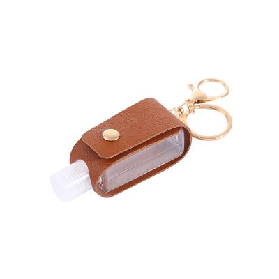 China Luxury Self Defense Luxury Safety Set PU Hand Sanitizer Perfume 30ml Leather Bottle Holder Key Chain for sale