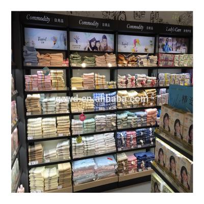 China Single Sided Supermarket Duty Free Shop Wall Display Stand Shelf Rack Custom Design In Guangzhou Factory for sale