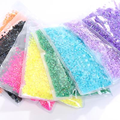 China New 43 Colors 2-6mm Shiny Round Flatback High Quality DIY Xiaopu Resin Gemstone DIY Rhinestone For Garment Nail Art In Small Bags for sale