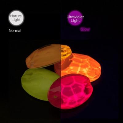 China Xiaopu Neon Manganese UV Light Glow Shinning Oval Sew On Gemstones For Dance Dress for sale