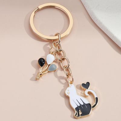 China Cute Key Chain Cat Heart Balloon Key Ring Keepsake Enamel Key Chains Friendship Gift For Women Men Handbag Car Keys DIY Jewelry for sale