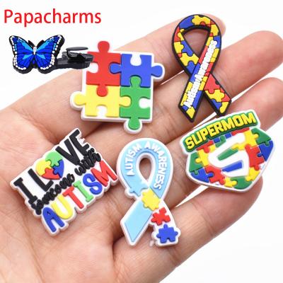 China Luxury Custom Soft PVC Croc shoe charm designer shoe charms luxury autism shoe decorations for wholesale croc charm for sale