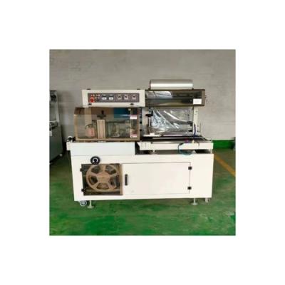 China Hotels High Quality Control Equipment Automatic Heat Film Shrink Packing Machine for sale