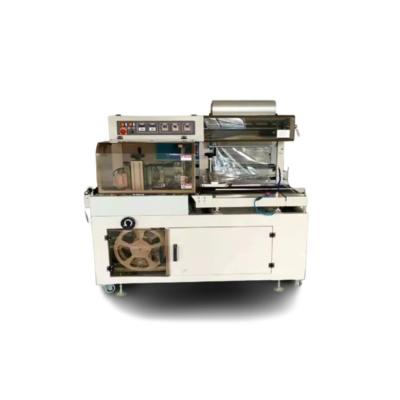 China Automatic Hotels Competitive Price Towel Heat Shrink Film Cutting Making Machine for sale