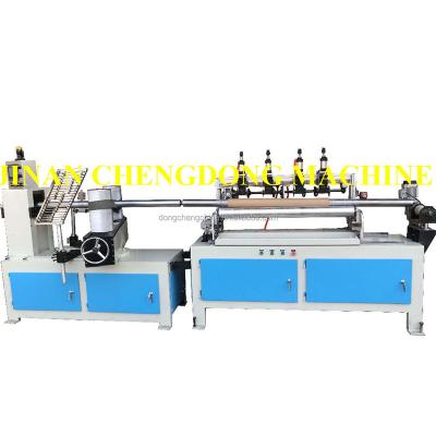 China Small Size Paper Tube Slitting And Rewinding Roll Making Machine With Gift Paper Box Online Multi Blade Slitting Production Line for sale