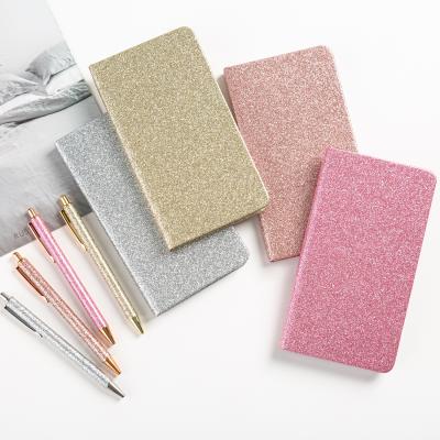 China Handmade hot sale creative bling notebook with gold powder ballpoint pen set for students for sale