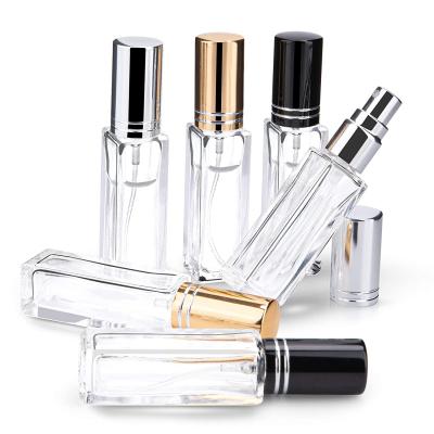 China Square Clear 10ml 30ml 100ml Personal Care 50ml Glass Perfume Bottle With Spray Gold And Sliver Cap for sale