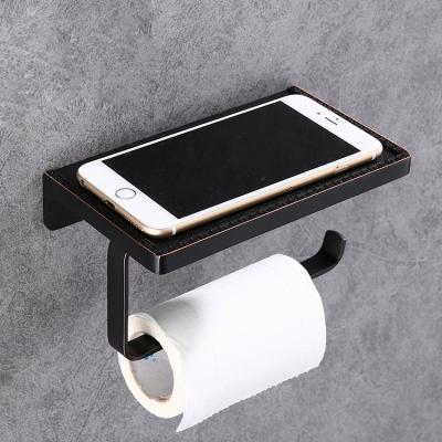 China Modern Luxury Brass Hardware Matte Black Wall Mounted Toilet Paper Holder With Shelf for sale