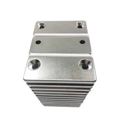 China Industrial Magnet Custom Nickel Coated Block To Form Two Countersunk Holes Strong Neodymium Magnets for sale