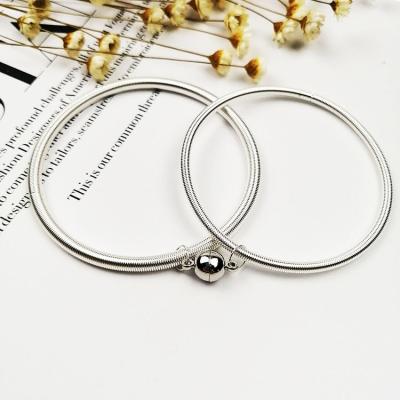 China AmorYubo TRENDY Fashion 2pcs Couple Charm Spring Chain Magnetic Bracelet for sale