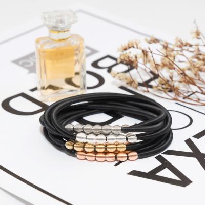 China Environmental Friendly Black Beads Elastic Bracelets AmorYubo Stainless Black Bracelet Customized Bracelets for sale