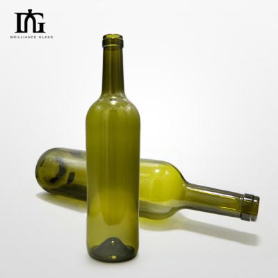 China 750ml 700ml Red Wine Glass Bottle with Shrink Film and Engraved Surface Handling on Glass for sale