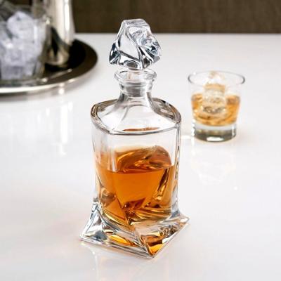 China 750ml Frosted Whisky Liquor Glass Bottle with Engraved Design and Base Material Glass for sale