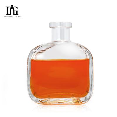 China OEM/ODM Accptable 700ml 750ml Oval Shaped Liquor Glass Bottle for Liquors and Beverages for sale