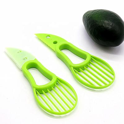 China Sustainable Fruit Slicer Plastic 3 in 1 Avocado Slicer Tool Knife Fruit Cutter for sale