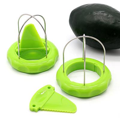 China Sustainable Plastic Kiwi Knife Cutter Peeler Slicer for sale