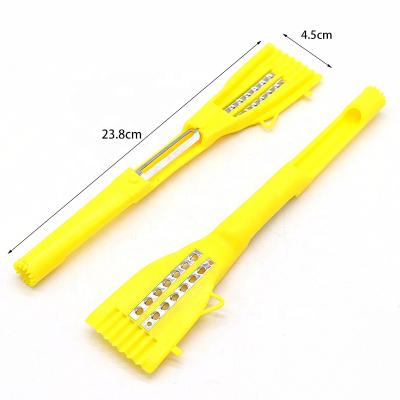 China Innovative multifunctional plastic stainless teel kitchen instruments cheese grater hollow punch peeler viable for sale