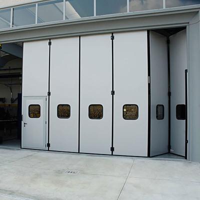 China China Manufacturer Industrial Automatic Steel Folding Door For Warehouse for sale