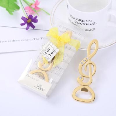 China Viable Music Notes Antique Gold Wedding Favor Bottle Opener Metal Bottle Openers for sale