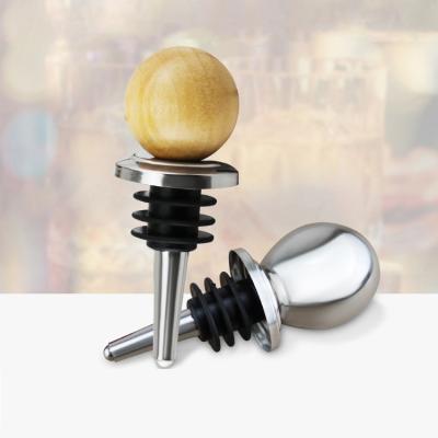 China Canned Opened Wine Ball Silicone Sealed Oil Bottle Stopper Stainless Steel Vacuum Red Wine Bottle Wood Stopper Bottles for sale