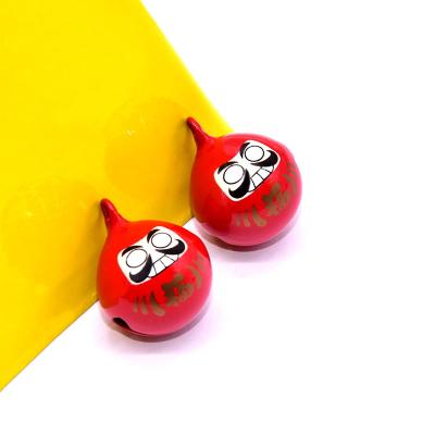 China Red Spot Japan Harlequin Cartoon Dharma Blessing Bell Mobile Phone Opening Single-Terms Pendant Jewelry for sale