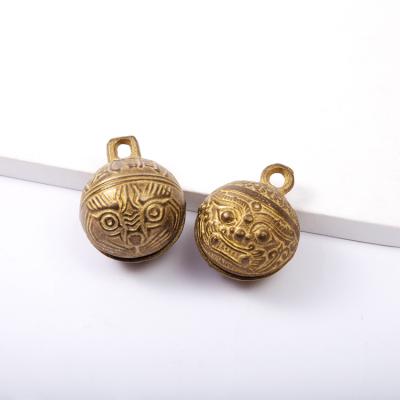 China Europe Manufacturers Supply Pure Brass Tiger Head Bell Ornaments Antique Pet Tiger Bell Key Pet Collar for sale