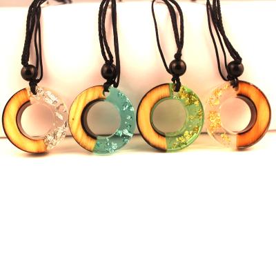 China BOHEMIA Round Moon Ring Transparent Pendant Necklace Women Natural Wood Resin Necklace Fashion Jewelry for sale