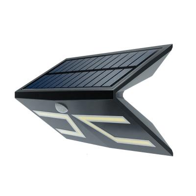 China Waterproof IP65 LED Solar Garden Wall Lamp Garden Led Solar Lights for sale