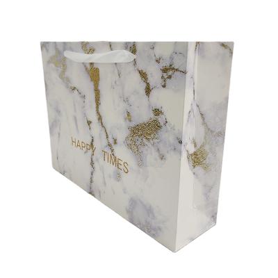 China 2021Latest Fashion Recyclable High-end Marble Texture Thickened Paper Bag With Souvenir Packaging Bag for sale