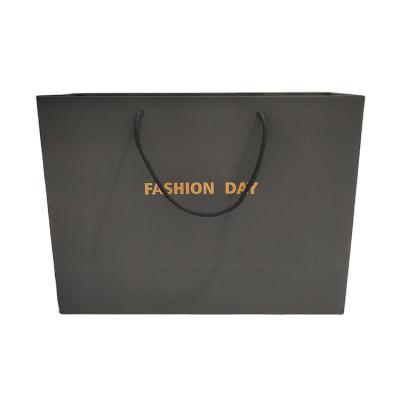 China Custom Black Matte Recyclable Porcelain Cardboard Paper Lunch Shopping Bag Gold Foil Logo Sleeves for sale