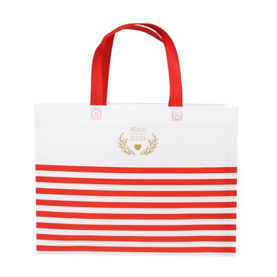 China Bestselling Recyclable Nonwoven Fabric Large Capacity Striped Hot Pressed High Quality Durable Tote Bag for sale