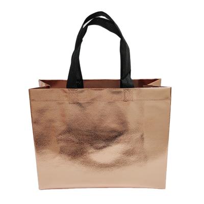 China OEM China Nonwoven Pink Gold Clothing Tote Bag Mall BIODEGRADABLE Customized Shopping Bag for sale