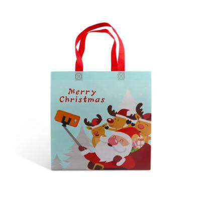 China Recyclable Recycled Metallic Non Woven Blanket Storage Pocket Santa Christmas Drawstring Bag for sale