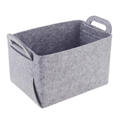 China Sustainable Felt Storage Basket Living Room Tea Table Sundries Basket Fabric Felt Storage Box Bedroom Jars Storage for sale