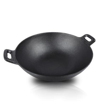 China New Arrival 2022 Sustainable Round Shape Wok Cast Iron For All Types Of Ovens Cast Iron Wok Stoves And Induction With Wooden Handle for sale