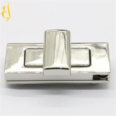 China Zinc Alloy Luggage Lock Rectangle Metal Purse Bag Twist Turn Buckle Lock With Logo for sale