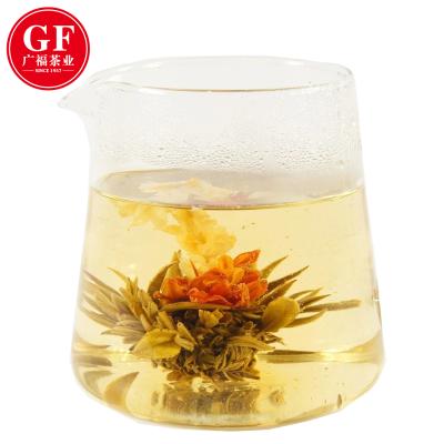 China Opening in Hot Water Man Tian Xian Tao Blooming Silver High Tea Needle with Gomphrena globosaa marigold and jasmine flowers for sale