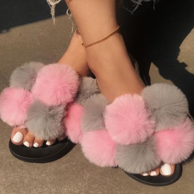 China Fashion Trend 4 Colors Multicolor Hair Ball Fox Fur Flat Slippers For Women for sale