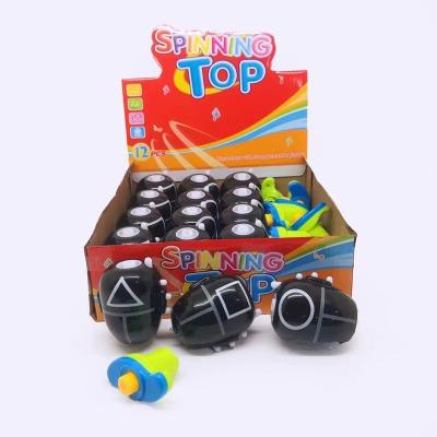 China 2021 New Squid Music Children's Game Light Cartoon Gyro Compass Plastic Toy Instant Press Launcher Spinning Boys And Girls Toys Gift for sale