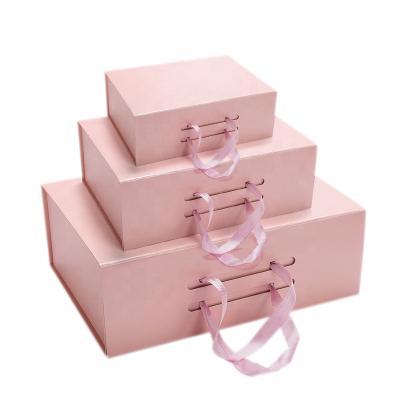 China Handmade Wholesale Pink Magnet Box For Gift Packaging Foldable Gift Luxury Magnetic Packaging Box With Ribbon for sale