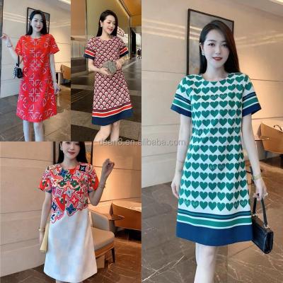 China High quality Anti-wrinkle oversized women's big bow tie bow sleeve short flower vintage casual dress manufacturers wholesale for sale