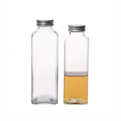 China Hot Sale 350ml 420ml 500ml Beverage KDG Customize Square Empty Transparent Glass Beverage Bottle Manufacturer for sale