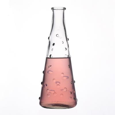 China Beverage Customize Fancy Dot Design 350ml Glass Beverage Bottles For Conical Shape Decoration With Cork Lids for sale