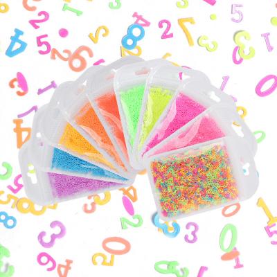 China Trendy 3d Number Glitter Nail Fluorescence Manicure Decals Glow Glow in the Dark Nail Art Glitter Nail Sequins for sale