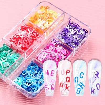 China Wholesales Grid 6/26 Set Fashionable Laser Nail Letter Sticker Glitter Roman Alphabet Letters Diamond Glitter For Nails for sale