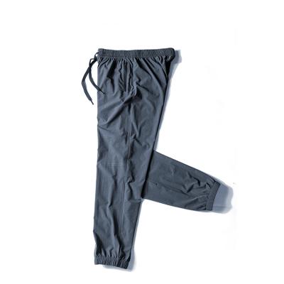 China 2021 Men Fitness Sports Casual Wear Trousers Solid Color Hip Hop Gym Wear Breathable High Quality Pants for sale